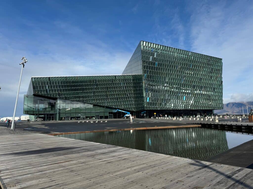 Modern glass building with geometric design,